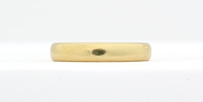 Lot 452 - An 18ct gold band ring