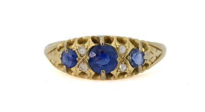 Lot 438 - A circular-shape sapphire and rose-cut diamond ring