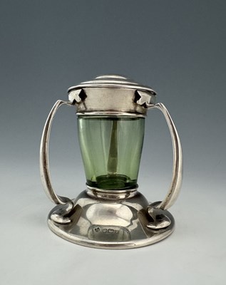 Lot 171 - An Edwardian Arts and Crafts silver and glass...