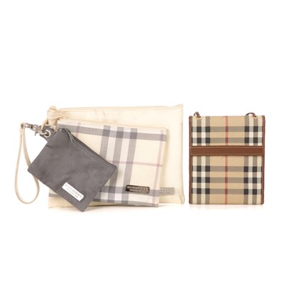Lot 256 - Burberry, a wallet with strap and a pouch set,...