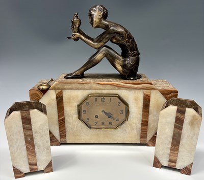 Lot 158 - Toussaint, Limoges, a French Art Deco onyx and...