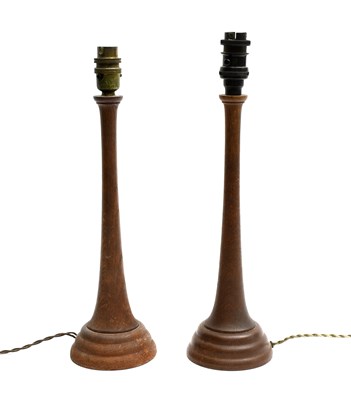 Lot 399 - A pair of oak table lamps in the manner of...