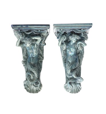 Lot 204 - A pair of Dunmore Pottery wall brackets, each...
