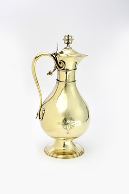 Lot 479 - A Gothic Revival brass flagon in the manner of...