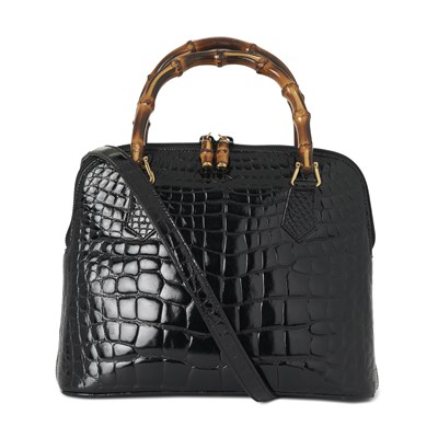 Lot 310 - Gucci, a vintage alligator Domed Bamboo Handle handbag.