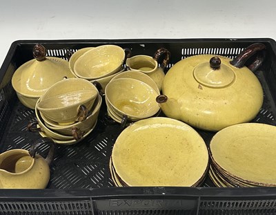 Lot 57 - A yellow and brown glazed Dieulefit pottery...