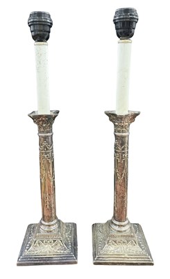 Lot 167 - A Pait of silverplated candlesticks, later...