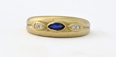 Lot 431 - An 18ct gold sapphire and brilliant-cut diamond three-stone ring