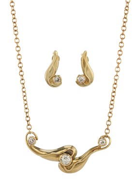 Lot 172 - An 18ct gold diamond set necklace and earrings