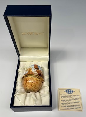 Lot 117 - A Moorcroft enamelled box, formed as a hinged...