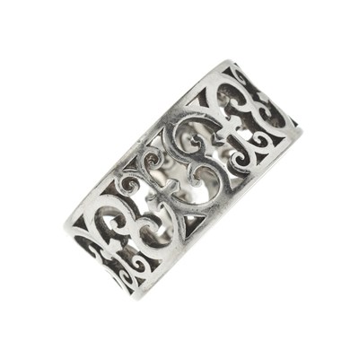 Lot 414 - Tiffany & Co., an Enchant wide band ring.