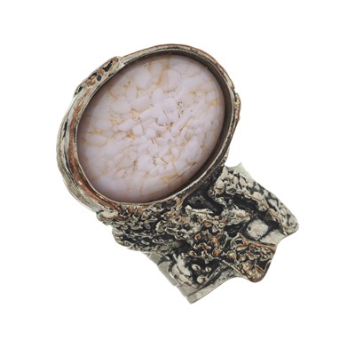 Lot 410 - Yves Saint Laurent, a pink and gold paste abstract ring.