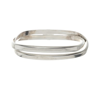 Lot 327 - Gucci, two interlocking bangles.