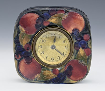 Lot 19 - 'Pomegranate' a Moorcroft Pottery mantel clock...