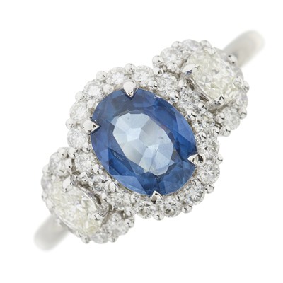 Lot 119 - A sapphire and diamond triple cluster ring