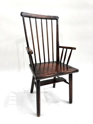 Lot 587 - A provincial stickback armchair, mixed...