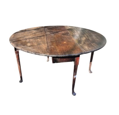 Lot 607 - A Georgian mahogany gateleg table with oval...