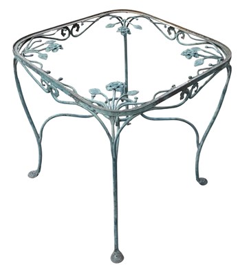 Lot 611 - A decorative wrought iron garden table frame...