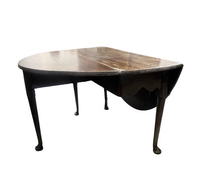 Lot 608 - A provincial Georgian oak gateleg table with...