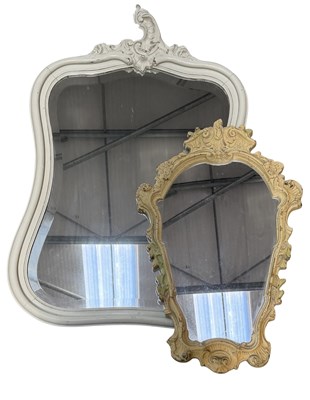 Lot 647 - A painted wooden wall mirror, bombe form with...