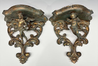 Lot 162 - A pair of carved wooden wall brackets or...