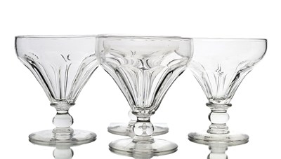 Lot 584 - Four George III flute moulded glass sweetmeat...