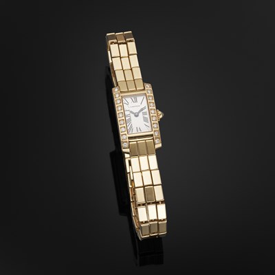 Lot 193 - Cartier, an 18ct gold Tank Allongée 'Brick' bracelet watch