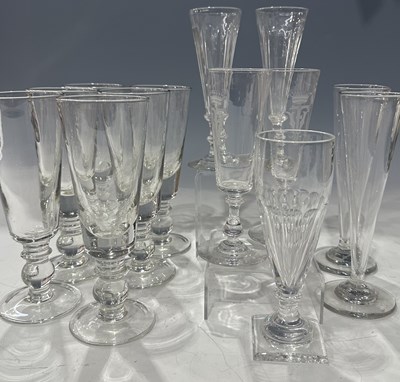 Lot 44 - A collection of late 19th century wine flutes,...