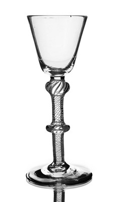 Lot 570 - A double knopped opaque twist wine glass,...
