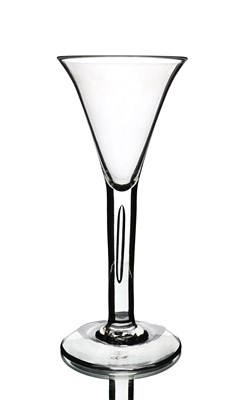 Lot 578 - A large air bubble stem wine glass, circa 1740,...