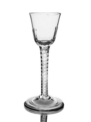 Lot 573 - An opaque twist wine glass, circa 1760, the...