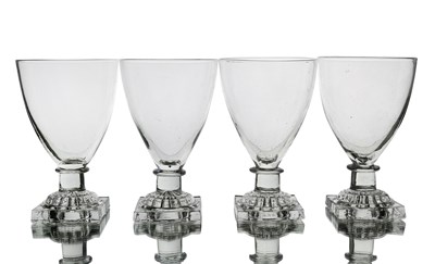 Lot 584A - A set of four George III glass rummers, circa...