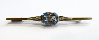 Lot 455 - A 14K yellow and white gold brooch low set...