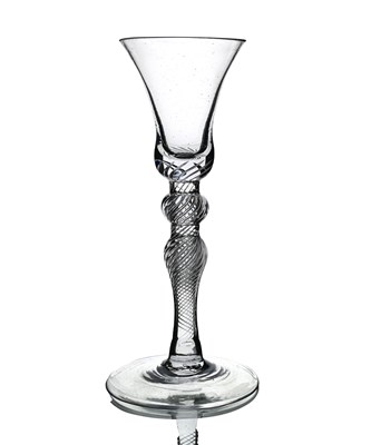 Lot 564 - A double knopped airtwist wine glass, the bell...