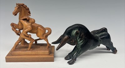 Lot 151 - A midcentury bronze-type metal figure of a...