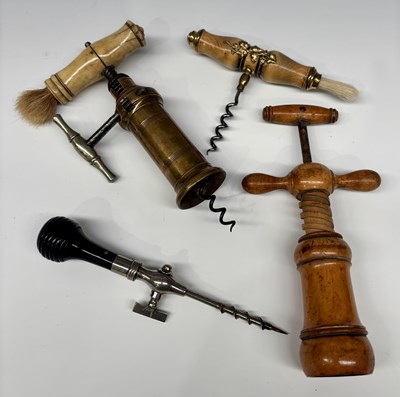 Lot 184 - A collection of corkscrews and a champagne tap,...