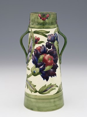 Lot 223 - William Moorcroft, a Persian twin handled vase,...