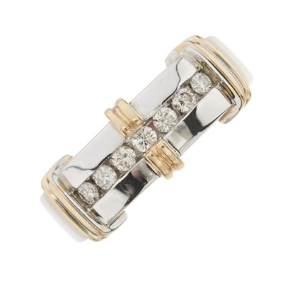 Lot 87 - A bi-colour brilliant-cut diamond set band ring