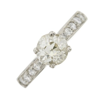 Lot 37 - A platinum old-cut diamond single-stone ring with brilliant-cut diamond shoulders