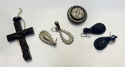 Lot 417 - A Victorian jet crucifix with relief floriate...