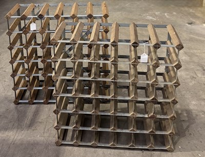 Lot 643 - Two medium pine and zinc wine racks, 63 by...