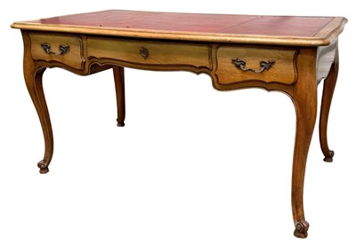 Lot 592 - A French Louis XV style walnut writing desk...