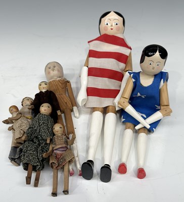 Lot 173 - A naive family of Dutch Dolls or peg dolls,...