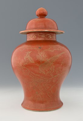 Lot 130 - A Chinese iron red and gilt decorated altar...