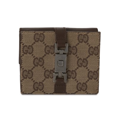 Lot 322 - Gucci, a Jackie compact wallet.
