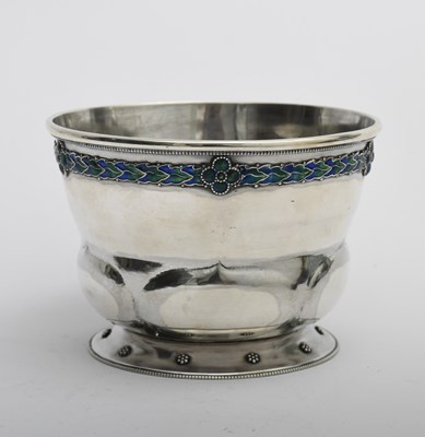 Lot 504 - A Liberty & Co silver and enamel vase, model...