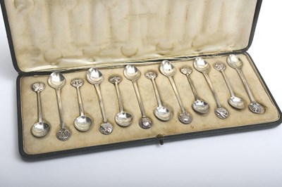 Lot 524 - A set of twelve Artificers Guild Ltd silver...
