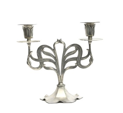 Lot 493 - An Art Nouveau Orivit pewter candlestick, twin-...