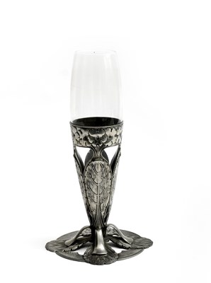 Lot 499 - An unusual Liberty & Co pewter vase with glass...