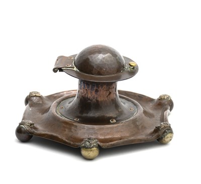 Lot 486 - A patinated copper inkwell probably A E Jones,...